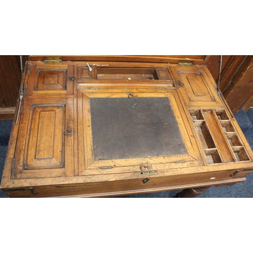 485 - Antique mahogany brass bound campaign table, the top opening to reveal a fitted interior, all raised... 