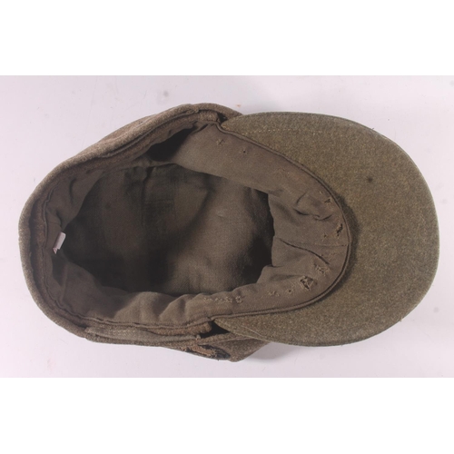 1785 - German WWII style Heer (army) field cap with SS Totenkopf skull badge and eagle cloth badge to side,... 