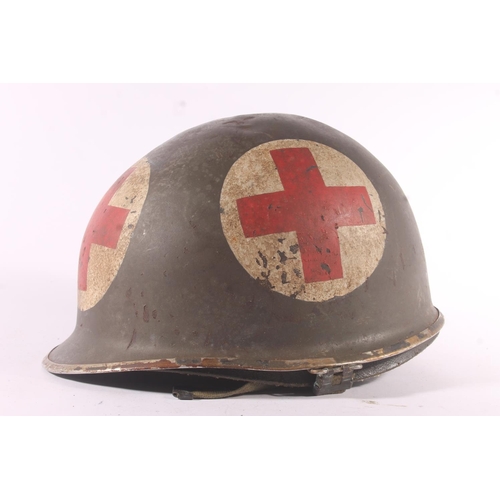 1788 - German M34 style steel helmet with painted medical red cross devices, complete with liner and leathe... 