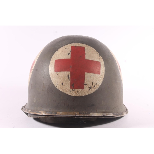 1788 - German M34 style steel helmet with painted medical red cross devices, complete with liner and leathe... 