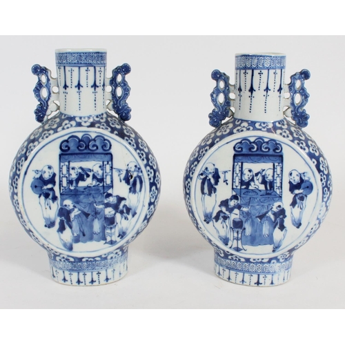 466 - Pair of Chinese blue and white porcelain moon flasks, late Qing period, with reticulated cloud handl... 
