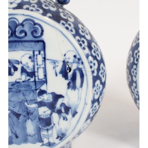 466 - Pair of Chinese blue and white porcelain moon flasks, late Qing period, with reticulated cloud handl... 