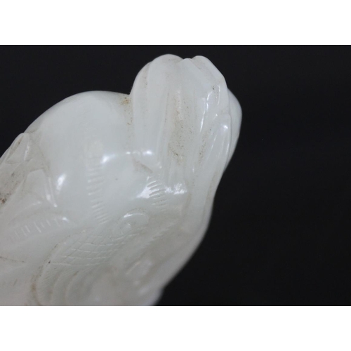 470 - Chinese celadon jade carving of a phoenix, late Qing/early Republic period, W5cm.
