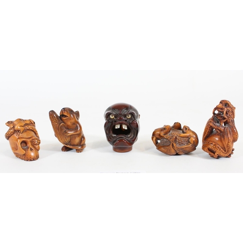 483 - Five Japanese carved boxwood Netsuke, Meiji Period, of a Oni head, Dragon, Mouse and Corn, Toads and... 