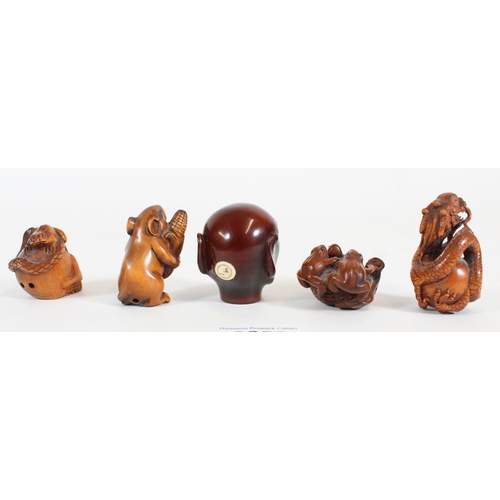 483 - Five Japanese carved boxwood Netsuke, Meiji Period, of a Oni head, Dragon, Mouse and Corn, Toads and... 