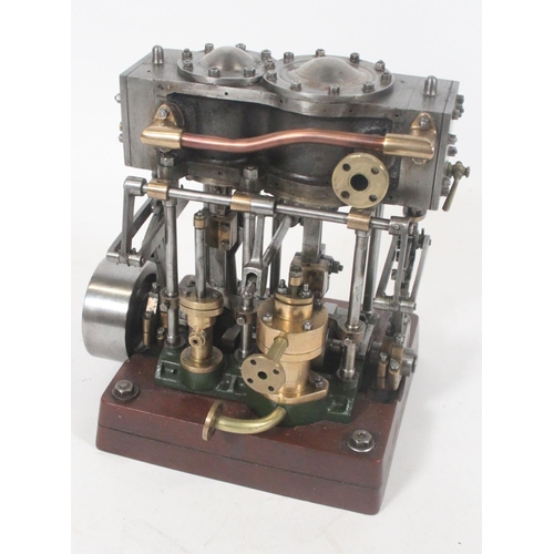 Live steam table top model of an engine, 19cm tall.