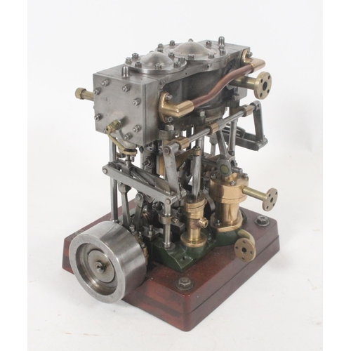 Live steam table top model of an engine, 19cm tall.