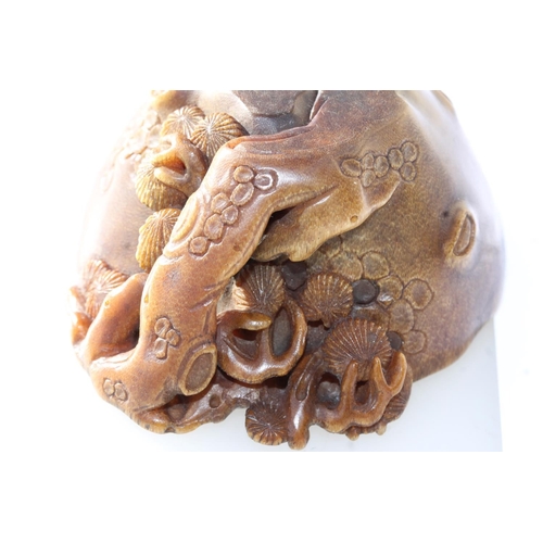 469 - Chinese Rhinoceros Horn libation cup, mid to late Qing period, the handle formed as a trunk extendin... 