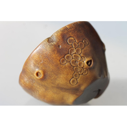 469 - Chinese Rhinoceros Horn libation cup, mid to late Qing period, the handle formed as a trunk extendin... 