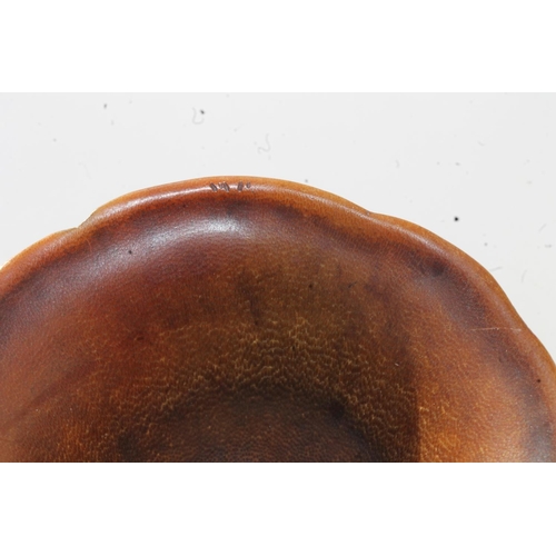 469 - Chinese Rhinoceros Horn libation cup, mid to late Qing period, the handle formed as a trunk extendin... 