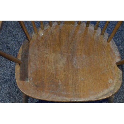 531 - Pair of Ercol elm and beech 'Cowhorn' chairs, 85cm high, and a pair of Ercol 'Quaker' chairs, c. 196... 