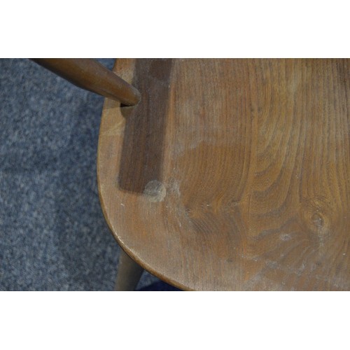 531 - Pair of Ercol elm and beech 'Cowhorn' chairs, 85cm high, and a pair of Ercol 'Quaker' chairs, c. 196... 