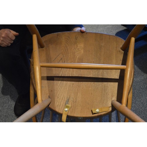 531 - Pair of Ercol elm and beech 'Cowhorn' chairs, 85cm high, and a pair of Ercol 'Quaker' chairs, c. 196... 