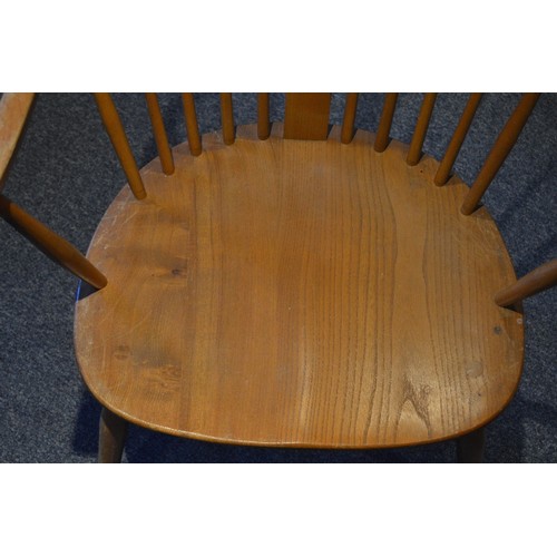 531 - Pair of Ercol elm and beech 'Cowhorn' chairs, 85cm high, and a pair of Ercol 'Quaker' chairs, c. 196... 