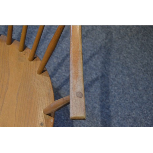 531 - Pair of Ercol elm and beech 'Cowhorn' chairs, 85cm high, and a pair of Ercol 'Quaker' chairs, c. 196... 