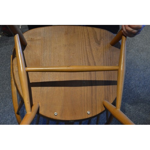 531 - Pair of Ercol elm and beech 'Cowhorn' chairs, 85cm high, and a pair of Ercol 'Quaker' chairs, c. 196... 