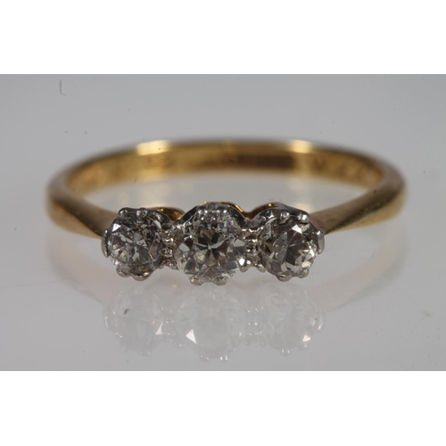 110 - 18ct yellow gold and platinum three stone diamond ring, the three diamonds in claw setting, size J, ... 
