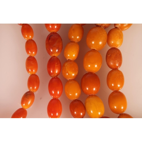 111 - Graduated strand of butterscotch amber beads, 83g and a similar stand of graduated beads, 33g.&nbsp;