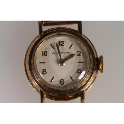 196 - Ladies 9ct gold Jaeger-Le Coultre wristwatch on 9ct gold strap, the dial with baton markers and alte... 