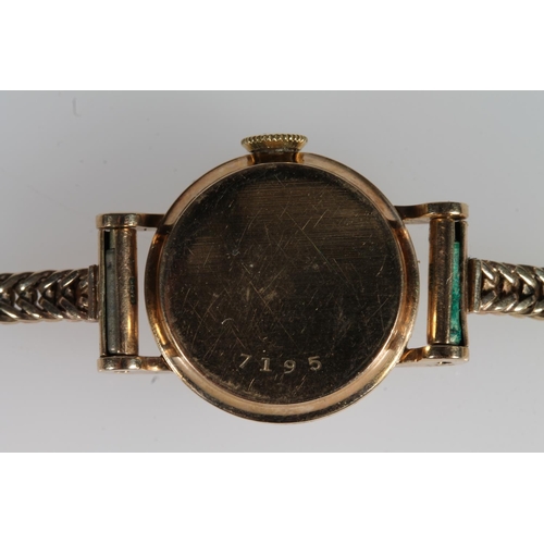 196 - Ladies 9ct gold Jaeger-Le Coultre wristwatch on 9ct gold strap, the dial with baton markers and alte... 