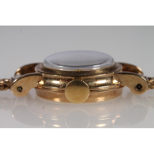 196 - Ladies 9ct gold Jaeger-Le Coultre wristwatch on 9ct gold strap, the dial with baton markers and alte... 