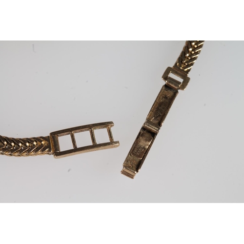 196 - Ladies 9ct gold Jaeger-Le Coultre wristwatch on 9ct gold strap, the dial with baton markers and alte... 