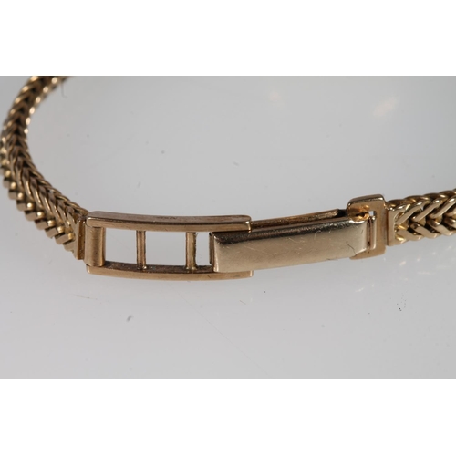 196 - Ladies 9ct gold Jaeger-Le Coultre wristwatch on 9ct gold strap, the dial with baton markers and alte... 