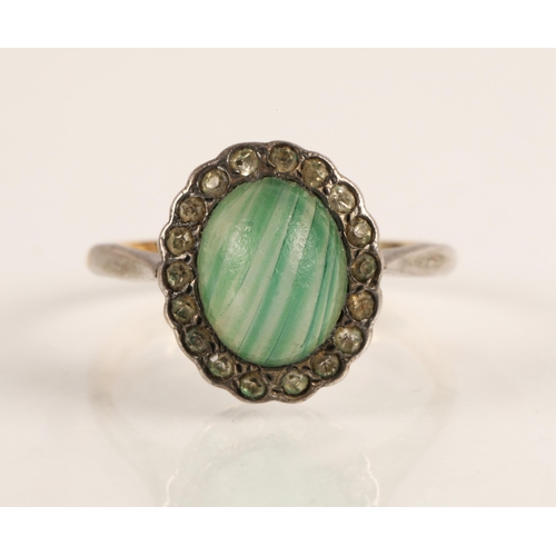 61 - 9ct gold and silver split-shank ring, set with a glass cabochon and white gems, ring size O/P, 3.4g