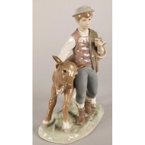 11 - Lladro figurine, young German boy with calf