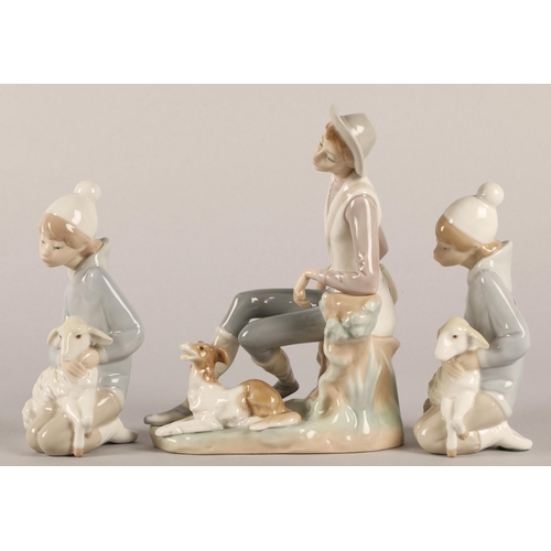 16 - Three Lladro figures, shepherd boy with dog and two boys with lambs (3)