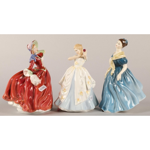 17 - Three Royal Doulton Figures to include Laura HN2960, Adrienne HN1963, and Autumn Breezes HN1934