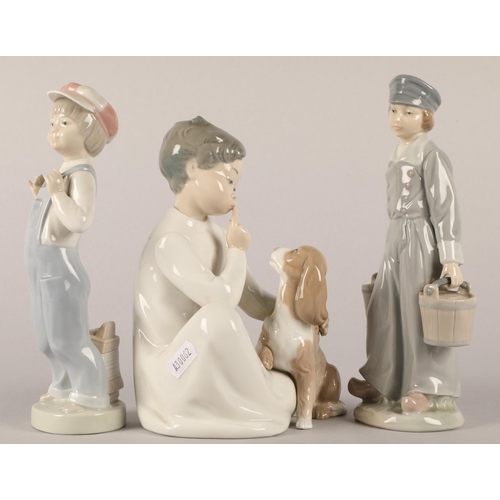 18 - Three Lladro figures to include boy with dog and two others (3)