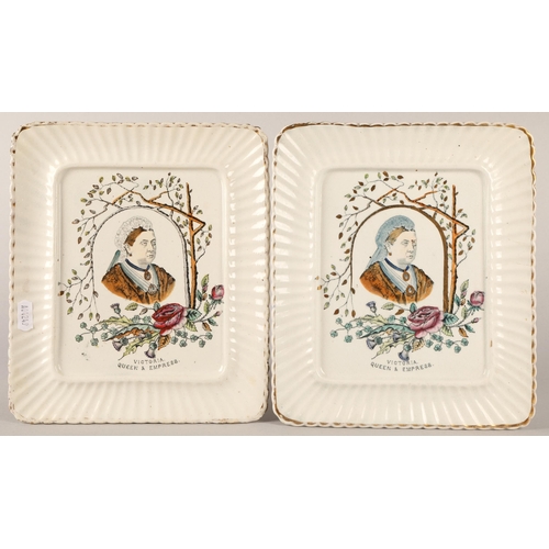 28 - Two rectangular creamware Queen Victoria 'Queen & Empress' wall plates, with a pair of 1897 comm... 