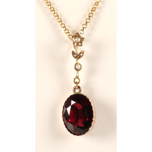 51 - Edwardian style pendent gemstone, possibly garnet, mounted in yellow metal with seed pearls, on a 9c... 