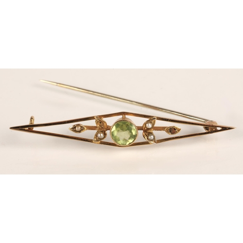 54 - 9ct gold Edwardian bar brooch set with peridot and seed pearls (two missing), 2.2g