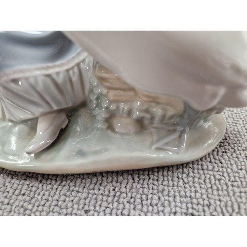 10 - Lladro figurine, a girl with swan