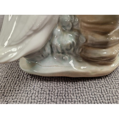 10 - Lladro figurine, a girl with swan