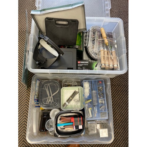 Two boxes of assorted tools and tool kits, a Dremel tool etc
