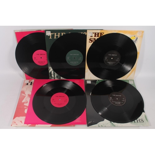 11 - The Smiths, 12'' vinyl singles to include Girlfriend In A Coma, Shoplifters Of The World Unite, Shei... 
