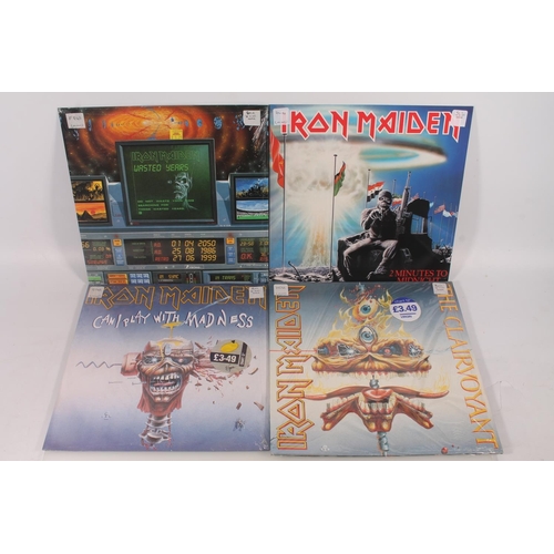 25 - Iron Maiden, 12'' vinyl singles to include The Clairvoyant with gatefold sleeve, 2 Minutes To Midnig... 