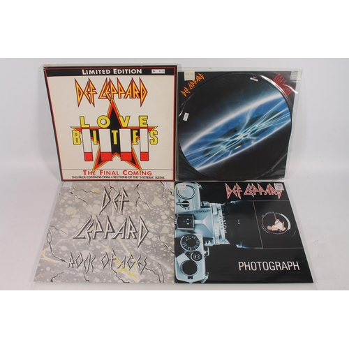 27 - Def Leppard, 12'' vinyl singles to include Animal, Hysteria, Love Bites, Armageddon, Have You Ever N... 