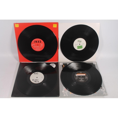 31 - INXS, 12'' vinyl singles to include Original Sin, Suicide Blonde, New Sensation (Nick Twelve Inch Mi... 