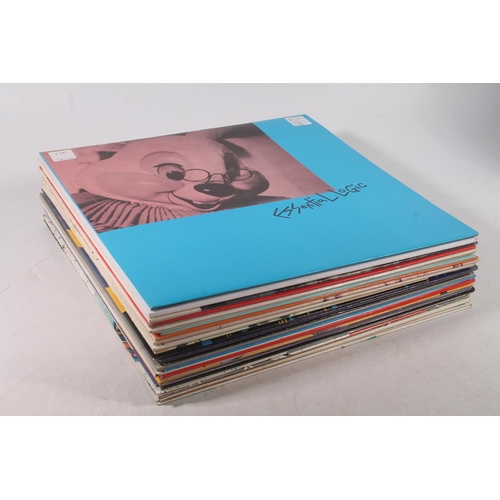 43 - Record case containing New Wave and other genres to include The Associates Tell Me Easter's On Frida... 