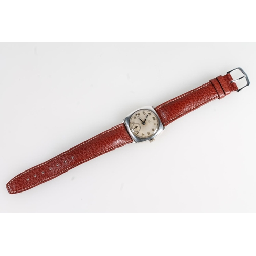 191 - 1930's silver cased gents Omega wristwatch, the champagne dial with arabic numeral chapter ring and ... 