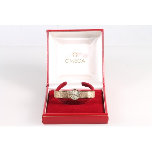 189 - 9ct yellow gold Smiths Empress ladies wristwatch on textured 9ct gold strap, the face with baton mar... 