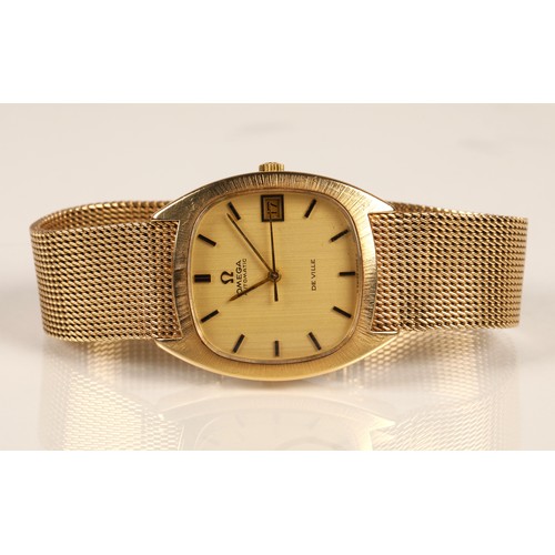 84 - 9ct gold Omega automatic wrist watch, champagne dial with baton hour markers and date aperture, on a... 