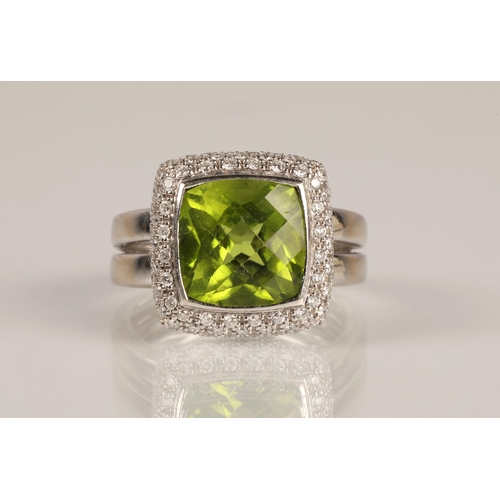 65 - Ladies peridot and diamond ring, central square cut peridot surrounded by three rows of small diamon... 