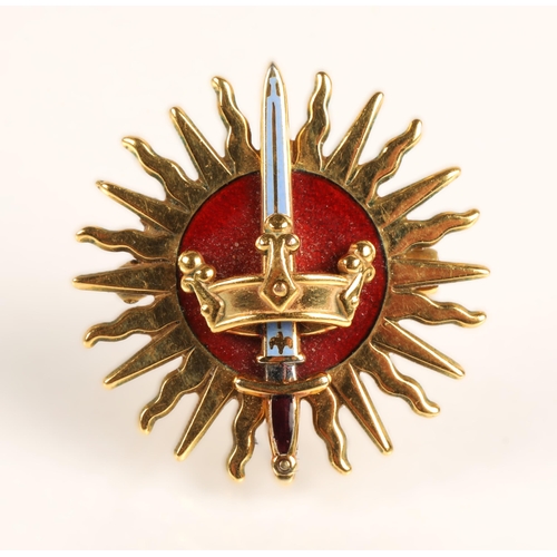 73A - Imperial Society Knights bachelor 9ct gold and enamel sunburst badge with a crown and sword by Garra... 