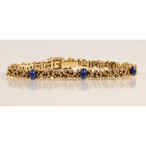 77 - Ladies 18ct yellow gold bracelet set with six lapis lazuli beads, gross weight 29.6g, approx. length... 