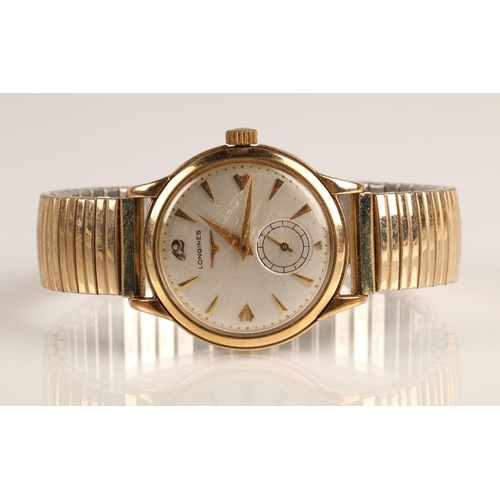 82 - Gents 9ct yellow gold Longines wrist watch, champagne dial with hour marker batons and subsidiary di... 